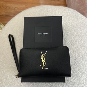 Almost new authentic YSL wallet on a chain